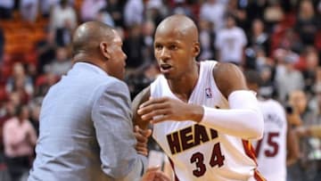 Oct 30, 2012; Miami, FL, USA; Miami Heat shooting guard Ray Allen (right) greets Boston Celtics head coach Doc Rivers (left) after their game at American Airlines Arena. The Heat won 120-107. Mandatory Credit: Steve Mitchell-USA TODAY Sports