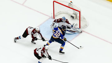 ST. LOUIS, MO - JANUARY 25: St. Louis Blues center Tage Thompson (32), center, moves in for a shot on Colorado Avalanche goaltender Jonathan Bernier (45) during the second period of an NHL hockey game. The St. Louis Blues defeated the Colorado Avalanche 3-1 on January 25, 2017, at Scottrade Center in St. Louis, MO. (Photo by Tim Spyers/Icon Sportswire via Getty Images)