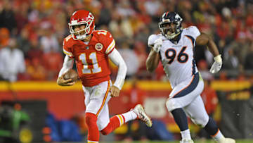 KANSAS CITY, MO - OCTOBER 30: Quarterback Alex Smith #11 of the Kansas City Chiefs scrambles for a first down against defense end Shelby Harris #96 of the Denver Broncos during the first half on October 30, 2017 at Arrowhead Stadium in Kansas City, Missouri. (Photo by Peter G. Aiken/Getty Images)