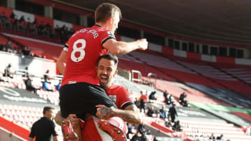 Southampton's English midfielder James Ward-Prowse (L) celebrates with Southampton's English striker Danny Ings after scoring the opening goal during the English Premier League football match between Southampton and Everton at St Mary's Stadium in Southampton, southern England, on October 25, 2020. (Photo by Andy Rain / various sources / AFP) / RESTRICTED TO EDITORIAL USE. No use with unauthorized audio, video, data, fixture lists, club/league logos or 'live' services. Online in-match use limited to 120 images. An additional 40 images may be used in extra time. No video emulation. Social media in-match use limited to 120 images. An additional 40 images may be used in extra time. No use in betting publications, games or single club/league/player publications. / (Photo by ANDY RAIN/AFP via Getty Images)