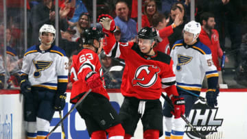 Nikita Gusev #97 (R) of the New Jersey Devils (Photo by Bruce Bennett/Getty Images)