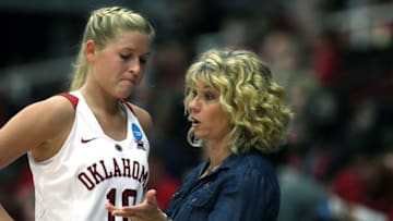 Mar 21, 2015; Stanford, CA, USA; Oklahoma Sooners guard Peyton Little (10) talks with Sooners head coach Sherri Coale during the second half of their game against the Quinnipiac Bobcats in the first round of the women