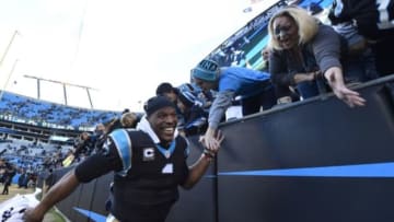 Nov 22, 2015; Charlotte, NC, USA; Carolina Panthers quarterback Cam Newton (1) with fans after the game. The Panthers defeated the Redskins 44-16 at Bank of America Stadium. Mandatory Credit: Bob Donnan-USA TODAY Sports