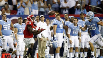 Sep 3, 2016; Atlanta, GA, USA; Georgia Bulldogs wide receiver Isaiah McKenzie (16) makes a catch against North Carolina Tar Heels linebacker Cole Holcomb (36) during the fourth quarter of the 2016 Chick-Fil-A Kickoff game at Georgia Dome. Mandatory Credit: Brett Davis-USA TODAY Sports