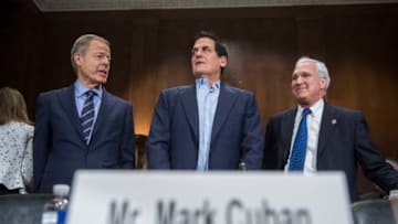 UNITED STATES - DECEMBER 07: From left, Jeffrey BewkesCEO of Time Warner, Mark Cuban, Chairman of AXS TV, and Gene Kimmelman, CEO of Public Knowledge, prepare to testify during a Senate Judiciary Subcommittee on Antitrust, Competition Policy & Consumer Rights hearing in Dirksen Building on the merger of AT&T and Time Warner, December 07, 2016. (Photo By Tom Williams/CQ Roll Call)