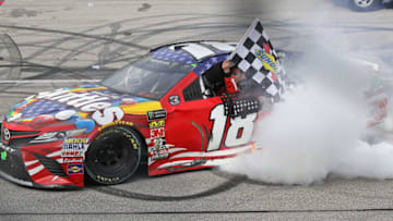 JOLIET, IL - JULY 01: Kyle Busch, driver of the #18 Skittles Red White and Blue Toyota. (Photo by Jonathan Daniel/Getty Images)
