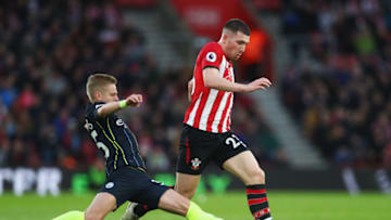SOUTHAMPTON, ENGLAND - DECEMBER 30: Pierre-Emile Hojbjerg of Southampton evades Oleksandr Zinchenko of Manchester City as he scores their first goal during the Premier League match between Southampton FC and Manchester City at St Mary's Stadium on December 29, 2018 in Southampton, United Kingdom. (Photo by Dan Istitene/Getty Images)