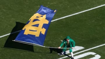 Nov 8, 2014; Tempe, AZ, USA; Notre Dame Fighting Irish mascot Leprechaun waves the team flag on the field against the Arizona State Sun Devils at Sun Devil Stadium. Arizona State defeated Notre Dame 55-31. Mandatory Credit: Mark J. Rebilas-USA TODAY Sports