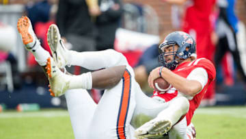 OXFORD, MS - OCTOBER 20: Defensive lineman Marlon Davidson #3 of the Auburn Tigers sacks quarterback Jordan Ta'amu #10 of the Mississippi Rebels during the forth quarter at Vaught-Hemingway Stadium on October 20, 2018 in Oxford, Mississippi. (Photo by Michael Chang/Getty Images)