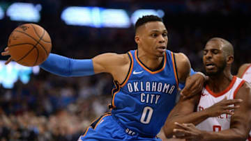 OKC Thunder guard Russell Westbrook (0) drives to the basket against guard Chris Paul (3): Mark D. Smith-USA TODAY Sports