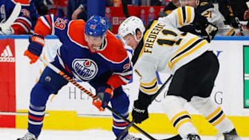 Edmonton Oilers forward Leon Draisaitl (29) and Boston Bruins forward Trent Fredcric (11) Mandatory Credit: Perry Nelson-USA TODAY Sports