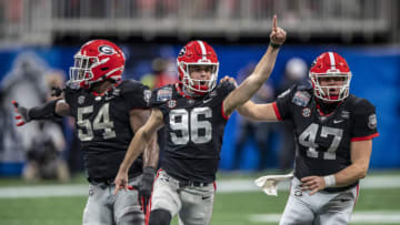 Jack Podlesny reacts after kicking the game winning field goal during a game against the Cincinnati Bearcats at Mercedes-Benz Stadium on January 1, 2021 in Atlanta, Georgia. (Photo by Benjamin Solomon/Getty Images)
