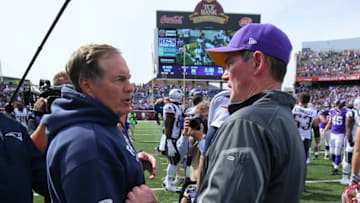 MINNEAPOLIS, MN - SEPTEMBER 14: Head coach Bill Belichick of the New England Patriots and head coach Mike Zimmer of the Minnesota Vikings greet on the field after the end of the game at TCF Bank Stadium on September 14, 2014 in Minneapolis, Minnesota. (Photo by Adam Bettcher/Getty Images)