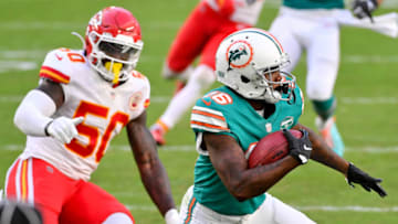 Dec 13, 2020; Miami Gardens, Florida, USA; Miami Dolphins wide receiver Antonio Callaway (16) runs with the ball against the Kansas City Chiefs during the second half at Hard Rock Stadium. Mandatory Credit: Jasen Vinlove-USA TODAY Sports
