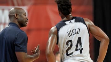 Jul 8, 2016; Las Vegas, NV, USA; New Orleans Pelicans head coach Robert Pack talks with guard Buddy Hield (24) during an NBA Summer League game against the Los Angeles Lakers at Thomas & Mack Center. Los Angeles won the game 85-65. Mandatory Credit: Stephen R. Sylvanie-USA TODAY Sports