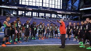 Feb 27, 2016; Indianapolis, IN, USA; Quarterbacks and wide receivers get instructions on the workout drills during the 2016 NFL Scouting Combine at Lucas Oil Stadium. Mandatory Credit: Brian Spurlock-USA TODAY Sports