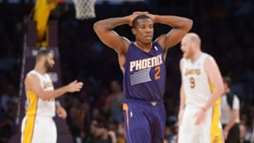 Mar 30, 2014; Los Angeles, CA, USA; Phoenix Suns guard Eric Bledsoe (2) reacts in the fourth quarter against the Los Angeles Lakers at Staples Center. The Lakers defeated the Suns 115-99. Mandatory Credit: Kirby Lee-USA TODAY Sports