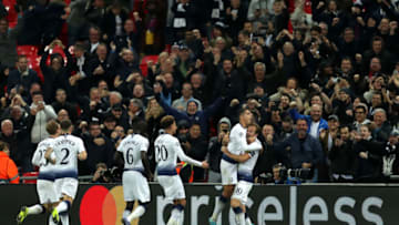 LONDON, ENGLAND - NOVEMBER 06: Harry Kane of Tottenham Hotspur celebrates with team mates Erik Lamela, Dele Alli, Davinson Sanchez and Kieran Trippier after scoring his team's second goal during the Group B match of the UEFA Champions League between Tottenham Hotspur and PSV at Wembley Stadium on November 6, 2018 in London, United Kingdom. (Photo by Richard Heathcote/Getty Images)