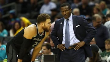 CHARLOTTE, NC - DECEMBER 12: Blake Griffin #23 of the Detroit Pistons talks to head coach Dwane Casey during their game against the Charlotte Hornets at Spectrum Center on December 12, 2018 in Charlotte, North Carolina. NOTE TO USER: User expressly acknowledges and agrees that, by downloading and or using this photograph, User is consenting to the terms and conditions of the Getty Images License Agreement. (Photo by Streeter Lecka/Getty Images)