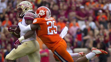 Nov 7, 2015; Clemson, SC, USA; Clemson Tigers cornerback Cordrea Tankersley (25) attempts to bring down Florida State Seminoles running back Dalvin Cook (4) during the first quarter at Clemson Memorial Stadium. Mandatory Credit: Joshua S. Kelly-USA TODAY Sports