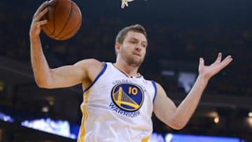 Apr 27, 2014; Oakland, CA, USA; Golden State Warriors forward David Lee (10) grabs a rebound during the first quarter in game four of the first round of the 2014 NBA Playoffs against the Los Angeles Clippers at Oracle Arena. The Warriors defeated the Clippers 118-97. Mandatory Credit: Kyle Terada-USA TODAY Sports