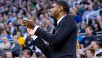 Jan 5, 2015; Salt Lake City, UT, USA; Indiana Pacers forward Paul George (13) reacts from the bench area during the second half against the Utah Jazz at EnergySolutions Arena. Indiana won 105-101. Mandatory Credit: Russ Isabella-USA TODAY Sports