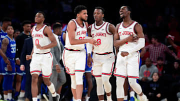 NEW YORK, NEW YORK - JANUARY 18: LJ Figueroa #30 of the St. John's basketball team celebrates a basket with teammate against the Seton Hall Pirates at Madison Square Garden on January 18, 2020 in New York City. (Photo by Steven Ryan/Getty Images)