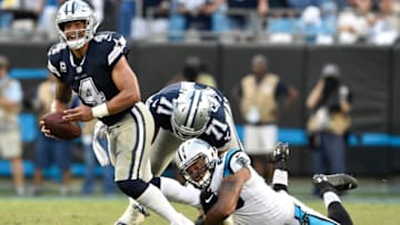 CHARLOTTE, NC - SEPTEMBER 09: Wes Horton #96 of the Carolina Panthers sacks Dak Prescott #4 of the Dallas Cowboys during their game at Bank of America Stadium on September 9, 2018 in Charlotte, North Carolina. The Panthers won 16-8. (Photo by Grant Halverson/Getty Images)