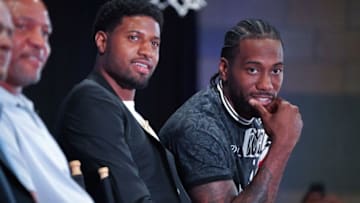 LOS ANGELES, CA - JULY 24: New Clippers players Paul George, left, and Kawhi Leonard attend a press conference at the Green Meadows Recreation Center in Los Angeles on Wednesday, July 24, 2019. George and Leonard were introduced to the media and fans as the newest members of the Clippers. (Photo by Scott Varley/MediaNews Group/Daily Breeze via Getty Images)