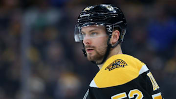BOSTON, MASSACHUSETTS - FEBRUARY 25: Sean Kuraly #52 of the Boston Bruins looks on during the second period of the game against the Calgary Flames at TD Garden on February 25, 2020 in Boston, Massachusetts. (Photo by Maddie Meyer/Getty Images)