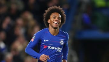 LONDON, ENGLAND - JANUARY 27: Willian of Chelsea celebrates after scoring his team's third goal during the FA Cup Fourth Round match between Chelsea and Sheffield Wednesday at Stamford Bridge on January 27, 2019 in London, United Kingdom. (Photo by Clive Rose/Getty Images)