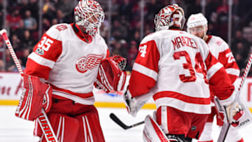 MONTREAL, QC - DECEMBER 02: Goaltender Jimmy Howard #35 of the Detroit Red Wings takes to the ice to replace teammate Petr Mrazek #34 against the Montreal Canadiens during the NHL game at the Bell Centre on December 2, 2017 in Montreal, Quebec, Canada. (Photo by Minas Panagiotakis/Getty Images)