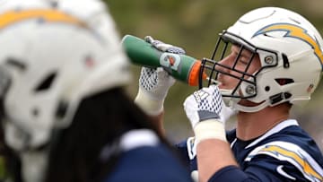 May 14, 2016; San Diego, CA, USA; San Diego Chargers defensive end Joey Bosa hydrates durng rookie mini camp at Charger Park. Mandatory Credit: Jake Roth-USA TODAY Sports