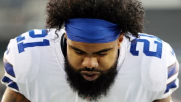 PHILADELPHIA, PENNSYLVANIA - DECEMBER 22: Ezekiel Elliott #21 of the Dallas Cowboys kneels in the end zone before the game against the Philadelphia Eagles at Lincoln Financial Field on December 22, 2019 in Philadelphia, Pennsylvania. (Photo by Patrick Smith/Getty Images)