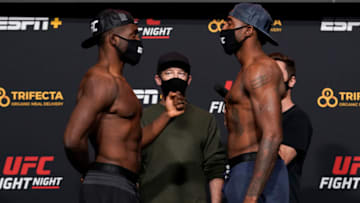 LAS VEGAS, NEVADA - DECEMBER 18: In this handout image provided by UFC, (L-R) Opponents Tafon Nchukwi of Cameroon and Jamie Pickett face off during the UFC Fight Night weigh-in at UFC APEX on December 18, 2020 in Las Vegas, Nevada. (Photo by Cooper Neill/Zuffa LLC via Getty Images)