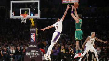 LOS ANGELES, CALIFORNIA - FEBRUARY 23: Jayson Tatum #0 of the Boston Celtics shoots the ball against Anthony Davis #3 of the Los Angeles Lakers during the second quarter at Staples Center on February 23, 2020 in Los Angeles, California. The Lakers won 114-112. (Photo by Katelyn Mulcahy/Getty Images)