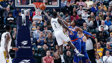 INDIANAPOLIS, IN - DECEMBER 04: Lance Stephenson #1 of the Indiana Pacers goes to the basket against Frank Ntilikina #11 of the New York Knicks in the first half of a game at Bankers Life Fieldhouse on December 4, 2017 in Indianapolis, Indiana. NOTE TO USER: User expressly acknowledges and agrees that, by downloading and or using the photograph, User is consenting to the terms and conditions of the Getty Images License Agreement. (Photo by Joe Robbins/Getty Images)