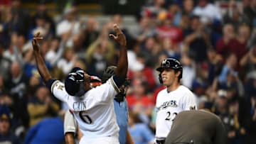 MILWAUKEE, WI - MARCH 28: Lorenzo Cain #6 celebrates after scoring on the three-run home run hit by Christian Yelich #22 of the Milwaukee Brewers in the third inning of the Opening Day game between the St. Louis Cardinals and the Milwaukee Brewers at Miller Park on Thursday, March 28, 2019 in Milwaukee, Wisconsin. (Photo by Stacy Revere/MLB Photos via Getty Images)