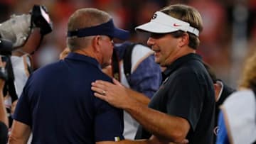 ATHENS, GEORGIA - SEPTEMBER 21: Head coach Brian Kelly (L) of the Notre Dame Fighting Irish talks with head coach Kirby Smart of the Georgia Bulldogs prior to a game at Sanford Stadium on September 21, 2019 in Athens, Georgia. (Photo by Kevin C. Cox/Getty Images)
