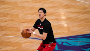Mar 13, 2021; Charlotte, North Carolina, USA; Toronto Raptors forward Yuta Watanabe (18) takes a shot during warm ups for the game against the Charlotte Hornets at Spectrum Center. Mandatory Credit: Jim Dedmon-USA TODAY Sports