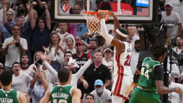 Miami Heat forward Jimmy Butler (22) dunks over Boston Celtics center Robert Williams III(Jasen Vinlove-USA TODAY Sports)