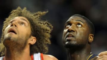 Dec 2, 2013; Portland, OR, USA; Portland Trail Blazers center Robin Lopez (42) and Indiana Pacers center Roy Hibbert (55) battle for position during the first quarter of the game at the Moda Center. Mandatory Credit: Steve Dykes-USA TODAY Sports