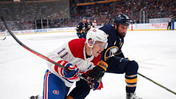 BUFFALO, NY - OCTOBER 25: Brendan Gallagher #11 of the Montreal Canadiens and Zach Bogosian #4 of the Buffalo Sabres race to a loose puck in the corner during the third period at the KeyBank Center on October 25, 2018 in Buffalo, New York. (Photo by Kevin Hoffman/Getty Images)