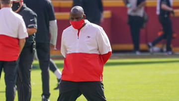 Oct 11, 2020; Kansas City, Missouri, USA; Kansas City Chiefs offensive coordinator Eric Bieniemy watches warm ups before the game against the Las Vegas Raiders at Arrowhead Stadium. Mandatory Credit: Denny Medley-USA TODAY Sports