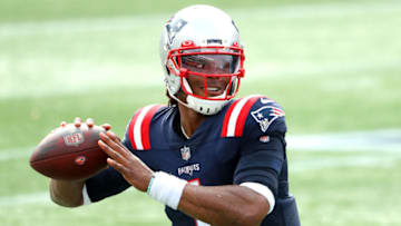 FOXBOROUGH, MASSACHUSETTS - SEPTEMBER 27: Cam Newton #1 of the New England Patriots passes the ball to warm up during the game against the Las Vegas Raiders at Gillette Stadium on September 27, 2020 in Foxborough, Massachusetts. (Photo by Maddie Meyer/Getty Images)