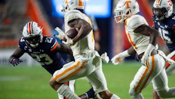 Auburn football defensive back Roger McCreary (23) tackles Tennessee wide receiver Velus Jones Jr. (1) at Jordan-Hare Stadium in Auburn, Ala., on Saturday, Nov. 21, 2020. Auburn and Tennessee are tied 10-10 at halftime.