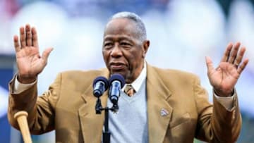 Apr 8, 2014; Atlanta, GA, USA; Former Atlanta Brave Hank Aaron speaks during a ceremony honoring the 40th anniversary of his 715th home run before the game against the New York Mets at Turner Field. Mandatory Credit: Daniel Shirey-USA TODAY Sports