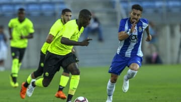 FARO, PORTUGAL - JULY 20: LOSC Lille forward Nicolas Pepe from Ivory Coast (L) tries to escape FC Porto defender Alex Telles from Brazil (R) during the match between FC Porto v LOSC Lille for Algarve Football Cup 2018 at Estadio do Algarve on July 20, 2018 in Faro, Portugal. (Photo by Carlos Rodrigues/Getty Images)