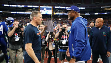 ST. LOUIS, MO - FEBRUARY 29: Head coach Jim Zorn of the Seattle Dragons and head coach Jonathan Hayes of the St. Louis BattleHawks talk after the XFL game at The Dome at America's Center on February 29, 2020 in St. Louis, Missouri. (Photo by Dilip Vishwanat/XFL via Getty Images)
