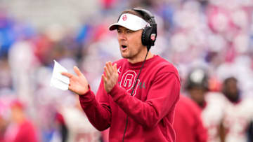 Oct 23, 2021; Lawrence, Kansas, USA; Oklahoma Sooners head coach Lincoln Riley celebrates after a touchdown against the Kansas Jayhawks during the second half at David Booth Kansas Memorial Stadium. Mandatory Credit: Jay Biggerstaff-USA TODAY Sports